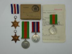 British Army WWII medals comprising 1939/45 Star, France and Germany Star, War Medal and Defence