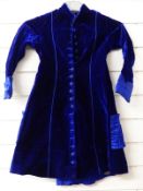 Victorian child's frock coat in blue velvet with decorated buttons and silk trim to back, pockets
