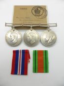 British Army WWII medals comprising War Medal and two Defence Medals in O.H.M.S box addressed to Mr.