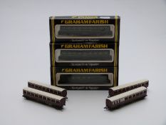 Seven Graham Farish and similar N gauge coaches comprising four suburban and three SR, three in