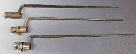 Three Martini Henry style bayonets one with W under crown stamp. Longest blade length 45cm.