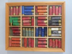 Wooden glazed shotgun cartridge display case with 60 12 bore shotgun cartridges.  PLEASE NOTE THAT A