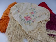 Three fringed shawls including an embroidered example