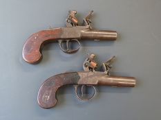 A pair of Howe of Colchester flintlock hammer action pocket pistols each with named and engraved