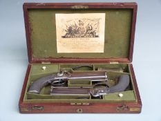A cased pair of Moore & Woodward 36 bore over and under percussion hammer action belt pistols both