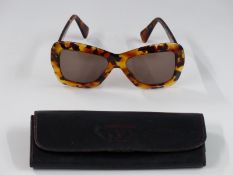A pair of vintage Valentino sunglasses with named case