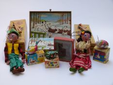Two Pelham Puppets SS Gypsy and SS Cowboy, three Japanese tinplate Garnier Cubes Disney puzzle