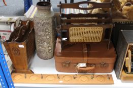 A large west German vase together with a vintage leather case,