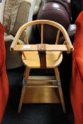 A mid 20th century beech adjustable high chair