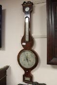 An early Victorian inlaid mahogany barometer