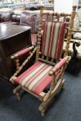 An early 20th century oak rocking chair