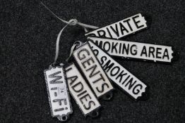 Six cast iron rectangular signs