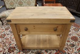 A reclaimed pine butcher's block fitted a drawer