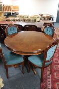 An Italianate pedestal table and four dining chairs