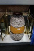 A heavy brass triple dressing table mirror and a West German vase