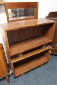 Two rosewood low shelves together with a rosewood framed mirror CONDITION REPORT: