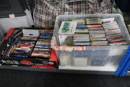 Two boxes of Cds and DVDs