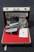 A cased Pfaff 95 electric sewing machine