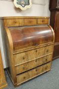 A continental mahogany cylinder bureau CONDITION REPORT: Faded throughout.