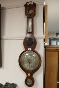 An early Victorian inlaid mahogany barometer