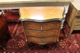 A continental ormolu mounted walnut three drawer chest
