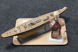 A wooden pond yacht together with a medical instruction aid - Gent's torso, height 28.