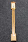An oak stick barometer