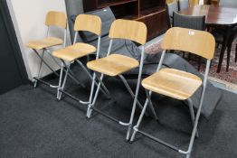 Four folding breakfast bar stools