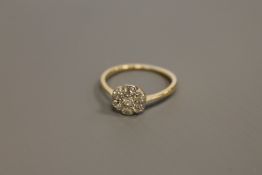 An 18ct gold diamond cluster ring CONDITION REPORT: The ring is in good condition.