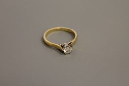 An 18ct gold solitaire diamond ring, estimated diamond weight 0.