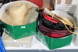 Two boxes of lady's hand bags, hats, Hush Puppy boots size 4,