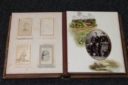 A Victorian leather bound musical photograph album