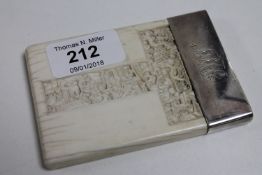 A 19th century Cantonese carved ivory card case with associated silver plated cover