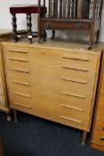 A mid twentieth century teak six drawer chest