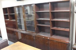A late 20th century triple section mahogany bureau bookcase
