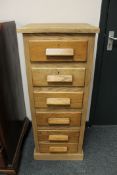An oak six drawer narrow chest CONDITION REPORT: Measures 43cm wide,