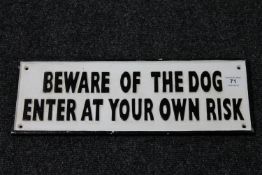 A cast iron sign - Beware of the dog