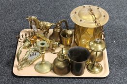 A tray of brass ware - bell, oil lamp, pestle and mortar,