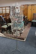 A mid twentieth century wire dress maker's dummy on stand