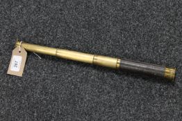 A brass and leather pocket telescope