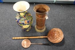 An embossed copper stick pot with two copper bed warming pans and large pottery jug