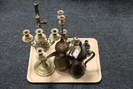 A tray of brass candelabra,