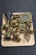 A tray of assorted brass ware, ashtrays,
