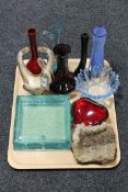 A tray of coloured continental glass ware together with a rock sample