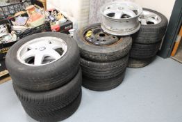 Ten car wheels - nine with tyres including four sets of alloy wheels