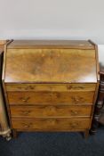 A mid twentieth century walnut writing bureau