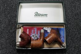A Peterson's of Dublin boxed three pipe bowls