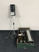 A box of vintage radios, wood working tools, staplers, shoe stretchers,