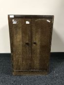 An oak double door record cabinet