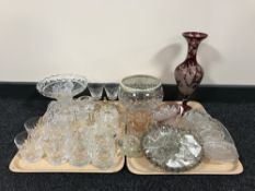 Two trays of glass ware, including ruby glass vase, glass light shade with drops,